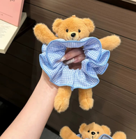 Bandeau pour cheveux en forme d'ours pour filles avec un design en peluche mignon. Un accessoire pour cheveux en queue de cheval longue. Un accessoire capillaire polyvalent