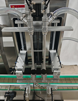 Machine de remplissage entièrement automatique à double tête à pompe à engrenages pour lotion corporelle, crème, sérum et émulsion