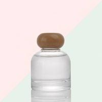 Bouteille diffuseur de parfum en verre transparent rond de 100 ml avec bouchon à vis en bois, vide, pour maison et hôtel, personnalisable avec logo