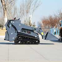 Mini-chargeuse compacte sur chenilles avec accessoires pour la construction agricole