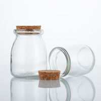 Usine personnalisée 100ML 150ML 200ML 300ML Bouteille en verre de luxe ronde avec couvercle en liège transparent pour pouding