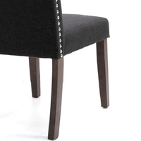 Chaise de salle à manger noire au design moderne, pieds en bois massif foncé, construction robuste, certifiée BSCI, garantie 1 an, pour la maison ou le bar
