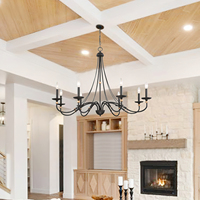 Lustre Westchester County en noir mat avec accents en laiton brossé style bougie bras ferme salle à manger éclairage suspendu