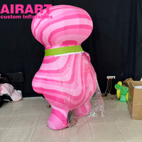 Oignon gonflable rose de dessin animé, adorable image de mascotte gonflable en forme d'oignon
