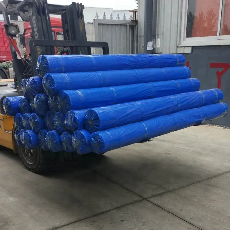 Heavy Tarpaulin Perforation Waterproof And Rainproof blue sliver orange rolls to Jakarta Indonesia