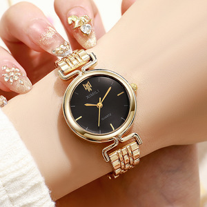 Reloj de pulsera redondo de acero para mujer, exquisito y de diseño exclusivo, reloj de cuarzo minimalista de alta gama para mujer - Product Image 5