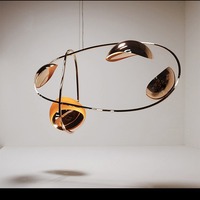 Lustre moderne de restaurant de bande d'art de concepteur lumières ovales haut de gamme pour l'éclairage créatif de style nordique de barre d'hôtel