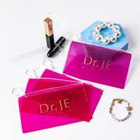 Logo estampage à chaud en or, transparent, résistance aux chocs, petit emballage transparent rose, anneau en plastique pvc, sac à fermeture éclair pour bijoux de maquillage