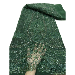 Tissu en dentelle à sequins brodé vert émeraude, idéal pour robes de mariée et de soirée – Tissus en dentelle française de haute qualité – Grande Vente - Product Image 1