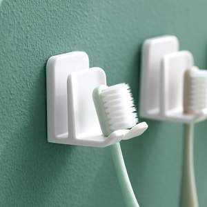 Soporte de pared Haojie para cepillos de dientes con ganchos, sin necesidad de taladrar, para uso en baño y aseo. - Product Image 3