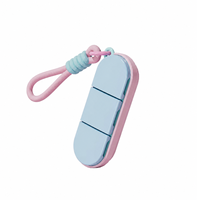 Boîte à pilules portable à 3 compartiments, étanche à l'humidité, organiseur de pilules hebdomadaire pour voyage avec cordon en silicone, vente en gros OEM
