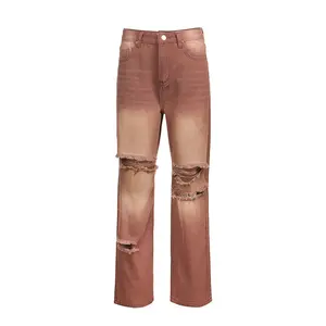 Jeans pour femmes de couleur graduée lavés à l'acide avec trous taille haute pantalon amincissant de couleur unie - Product Image 1