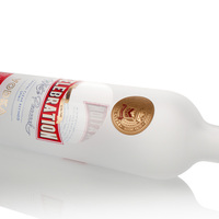 Bouteille en verre ronde givrée de luxe haut de gamme vide 700ml 750ml avec logo personnalisé pour la vodka, le rhum, le gin, la tequila, les spiritueux
