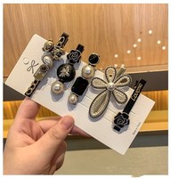 Pince à cheveux papillon avec perles, bijoux fantaisie, pince à clipser, pince à griffes avec chaîne de perles et pompon