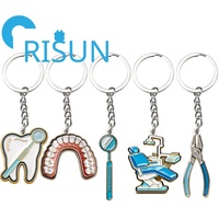 Porte-clés personnalisé pour clinique dentaire, en métal 3D, avec outils chirurgicaux dentaires (miroir buccal, pinces, dents)