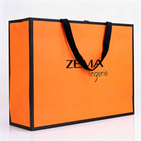 Sacs en papier orange de haute qualité pour vêtements, avec ruban gros-grain imprimé, logo personnalisé, taille et couleur sur mesure, grande capacité, emballage cadeau