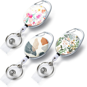 Factory direct UV printed flower oval easy-pull <b>buckle</b> metal back <b>clip</b> pull cord <b>clip</b> name card <b>clip</b> telescopic key ring - Product Image 2