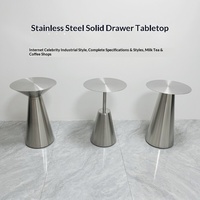 Table de salle à manger extérieure ronde compacte en acier inoxydable, style industriel moderne et épuré, 4 places, pour café et mobilier de salle à manger