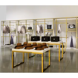 Vendita al dettaglio di moda personalizzata in oro porta abbigliamento in metallo per donna negozio per bambini porta abiti per negozi di abbigliamento