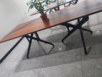 Table à manger extensible moderne en bois massif avec plateau en marbre artificiel et base ondulée
