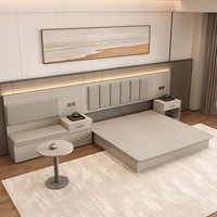Maßgefertigtes Modernes Hotel-Möbelset für Standard-/Gästezimmer Weiches Polsterbett mit TV-Tisch & Rückenlehne für Apartments