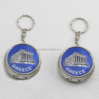 Porte-clés personnalisé Travelpro en alliage de zinc, autocollant de pharmacie rond, mini boîte à pilules, coupe-pilules, cadeau promotionnel tendance