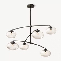 Luminaire suspendu en verre de qualité supérieure au design vintage avec finition en métal bronze antique, abat-jour en verre soufflé à la main transparent, restaurant, hôtel