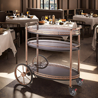 Chariot à liqueurs de luxe moderne en acier inoxydable or rose à 4 roues, avec rangement à vin 3 niveaux et plateau ignifuge pour hôtel, restaurant, maison
