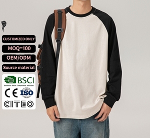 T-shirt en coton à manches longues pour homme, col rond, coupe ample, ourlet incurvé, manches raglan contrastées, tendance et best-seller - Product Image 1
