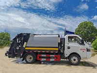 Camion à ordures diesel manuel Dongfeng 5000L avec compacteur hydraulique et fonction de recyclage pour le transport des déchets urbains