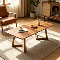 Table basse rectangulaire en bois massif moderne avec pieds creux en forme de V, design durable et profil bas pour salon