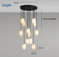 Lustre ovale minimaliste postmoderne en albâtre, lampe suspendue artistique sphérique multi-lumières pour escalier, villa, salon
