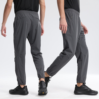 Pantalon de sport pour homme personnalisé en tissu extensible nylon-spandex, séchage rapide, taille élastique, coupe ample, idéal pour la course et la gym