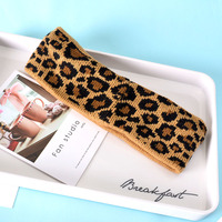 2025 élastique torsion arc tissu bandeau large léopard sport bandeau bandeau Spa soins de la peau maquillage bandeau pour laver le visage
