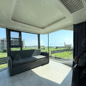 Maison capsule préfabriquée moderne et écologique pour l'extérieur, luxe, facile à déplacer pour les voyages et le camping, utilisation en centre commercial avec balcon - Product Image 3