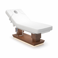 Lit électrique de luxe à hauteur réglable avec base en bois pour salon de spa esthétique