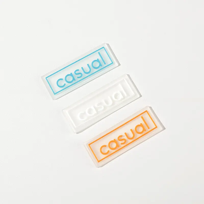 Wholesale Custom Transparent PVC Rubber Label Sew on Embossed 3d Small Silicone Rubber Labels For Garments