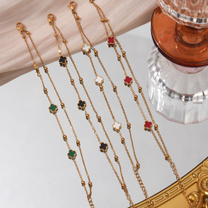 Bracelets de créateur de luxe célèbres en or 18 carats, argent et acier inoxydable, avec chaîne à maillons mini multicouches et breloques cinq fleurs, papillon, trèfle - Product Image 1