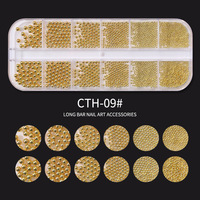 Nouveaux accessoires pour ongles transfrontaliers petites perles en acier dans une boîte longue à 12 grilles ensemble de clous en métal doré et argenté