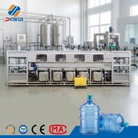 Machine de remplissage d'eau automatique 900 BPH pour bidons de 5 gallons, ligne intégrée de rinçage, remplissage et bouchage, directement de l'usine pour usine d'eau pure