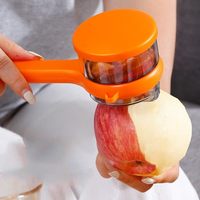 Moderne nieuwe handmatige multifunctionele schil- en schaafmes met opbergfunctie, huishoudelijk, van PP-materiaal, voor fruit en groenten.