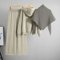 Ensemble deux pièces décontracté sport pour femme, style châle rayé, nouvelle collection automne/hiver 2026, avec sweat à capuche zippé et pantalon long ample à jambes larges