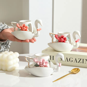 Ensemble de 6 tasses à café en céramique Swan avec soucoupes, capacité 100 ml, décor floral en relief, pour le thé de l'après-midi à la maison ou l'espresso - Product Image 1