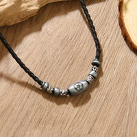 Pendentif spirale vintage sur collier en cuir tressé unisexe, pendentif métallique double anneau style bohème, cadeau