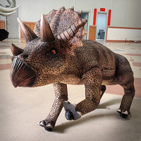 Dinosaure mécanique réaliste à chevaucher, robot quadrupède intelligent, raptor ambulant pour parcs d'attractions intérieurs et extérieurs