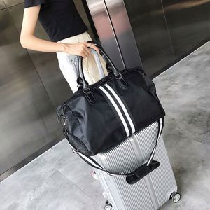 Échantillon gratuit Sac d'excursion personnalisé Sac de voyage portable Sac de sport en tissu imperméable de luxe Emballage du produit - Product Image 3