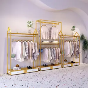 Kraliyet altın giyim ekran standı Metal asılı raf perakende hazır giyim mağazası Showroom pencere sergileme mobilyası