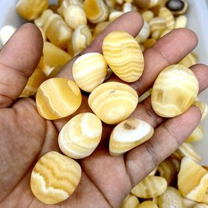 <span class=keywords><strong>Pietra</strong></span> burattata di <span class=keywords><strong>Calcite</strong></span> arancione di Spar islandese di miele giallo all'ingrosso in vendita - Product Image 1