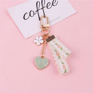 Cartoon Japan Small Flower Keychain for Women <b>Key</b> Chains <b>Ring</b> Bell Ribbon Car Bag Pendent Charm Airpods Accessories Gift - Product Image 4
