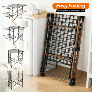 Séchoir à linge pliable en métal de haute qualité avec roulettes, pinces <span class=keywords><strong>et</strong></span> pieds aspect <span class=keywords><strong>bois</strong></span>, support de séchage pour intérieur <span class=keywords><strong>et</strong></span> extérieur, <span class=keywords><strong>noir</strong></span> - Product Image 3